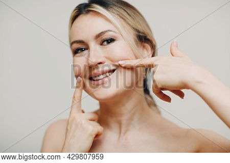 Young Adult Smile Woman Doing Facial Gymnastics Self Massage And Rejuvenating Exercises Face Buildin
