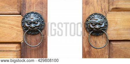 Close Up On Asia, China Bronze - Metal Twin Lion Style The Knocked Wood Door Is Slided Open Up With 