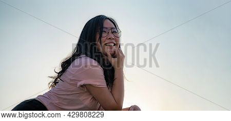 Asian Glasses Cute Woman Postures For Photo Shooting On The Rooftop Floor Beside Cement Terrace Barr