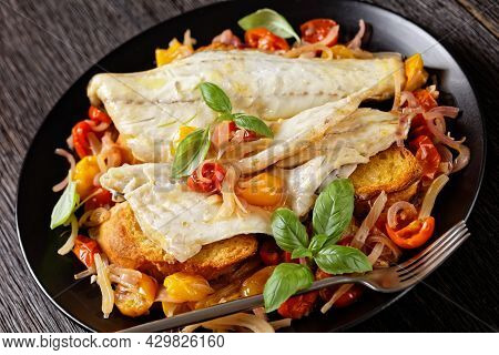 Close-up Of Acqua Pazza, Italian Poached Fish In A Tomato And White Wine Based Sauce With Fennel, He