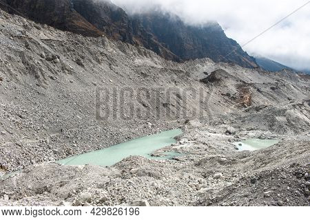 View Of Ngozumpa Glacier The Longest Glacier In The Himalayas Below The Sixth Highest Mountain In Th