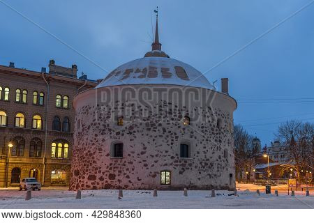 The Ancient Round Tower Close-up In February Twilight. Vyborg, Russia