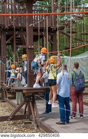 Saint Petersburg, Russia - August 11, 2021: Children With Their Parents In The Rope Town. Attraction