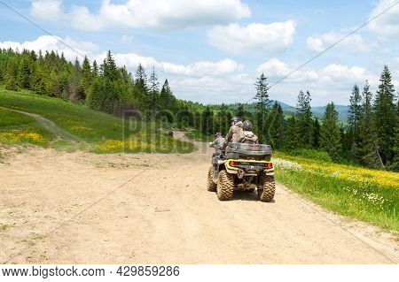 Slavsk. Ukraine. June 20. 2021. Tourists On Atvs On A Mountain Road. Extreme Vacation. Carpathian Mo