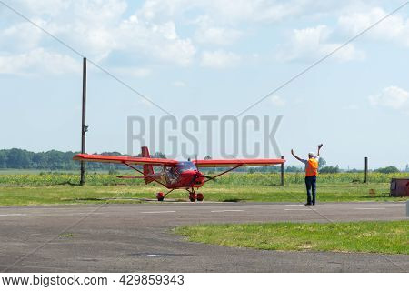 Gorodok.ukraine. June 6, 2021. Tsuniv Airfield. Training Aircraft, Preparation For The Flight. Pilot
