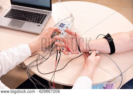 Patient Nerves Testing Using Electromyography At Medical Center