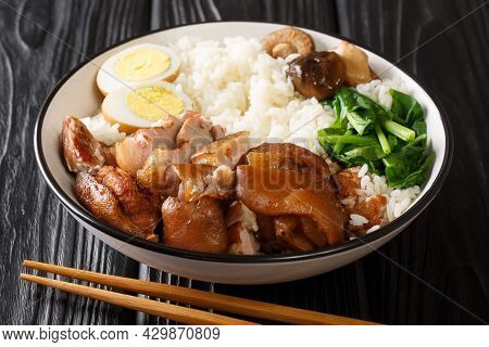 Pork Knuckle Rice Braised Pork Leg Or Khao Kha Moo Closeup In The Bowl On The Table. Horizontal