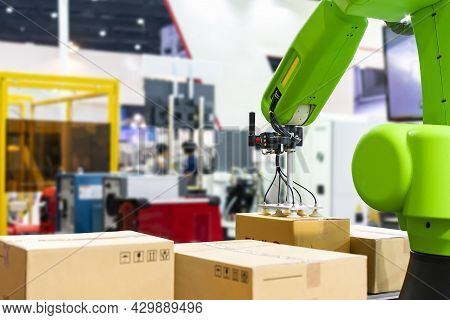 Close Up Precision Robot Arm And Automatic Vacuum Or Suction Cup For Pick - Place Transport Paper Bo