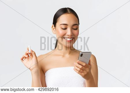 Beauty, Personal And Intimate Care, Mobile Application Concept. Smiling Pretty Asian Girl Having Per