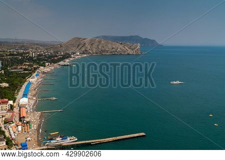 The Republic Of Crimea. July 12, 2021. A Picturesque View Of The City Of Sudak From The Height Of Th