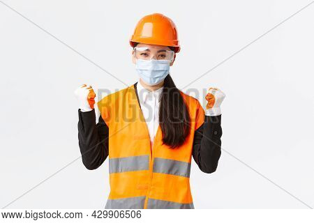 Covid-19 Safety Protocol At Enterpise, Construction And Preventing Virus Concept. Successful Winning