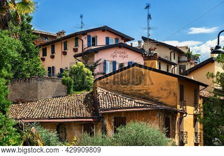 Desenzano Del Garda, Italy - July 10, 2019: View Of Traditional Colourful Old Buildings In The Histo