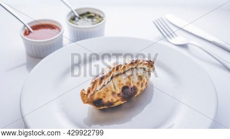 Traditional Argentinian Food Called Empanada On A White Background