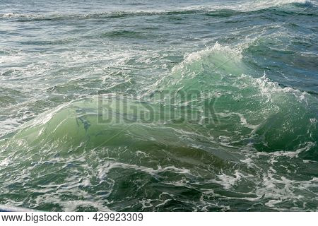 Waves Of Rough Sea Crashing Against Each Other.