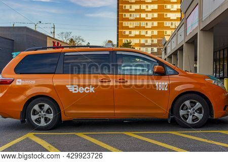 Toronto, Ontario, Canada, November 2020 - An Suv Cab From The Iconic Taxi Beck Company Parked Outsid