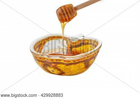Rosh Hashanah Is Concept For The Jewish New Year Holiday. An Apple-shaped Bowl With Honey And Stick