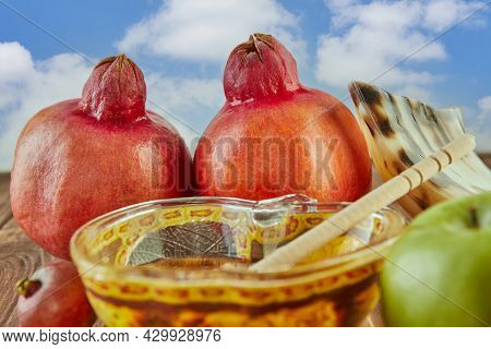 Rosh Hashanah - Jewish New Year Holiday Concept. A Bowl In The Form Of An Apple With Honey, Pomegran