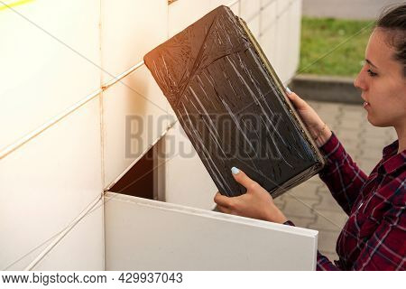 Postal Terminal. Post Delivery Automat Service And Hands With Parcel Courier Box. Mail Delivery And 
