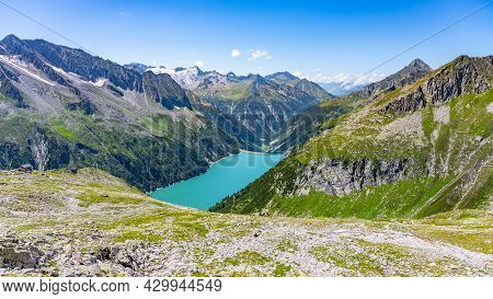 Beautiful Alpine Walley With Azure Blue Water Of Speicher Zillergrundl Dam, Zillertal Alps, Austria