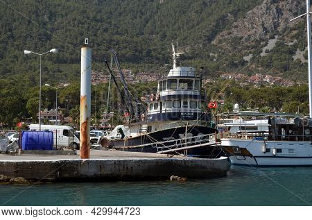 Boats and yachts at the in the marina of village Akyaka - slow city in Turkey.August 1,2021. Mugla,Turkey