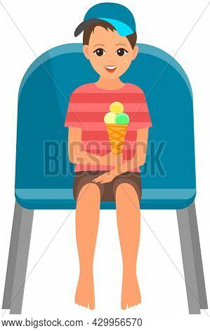 Little Boy With Ice Cream Sitting On Chair And Watching Show Isolated On White Background. Young Mal