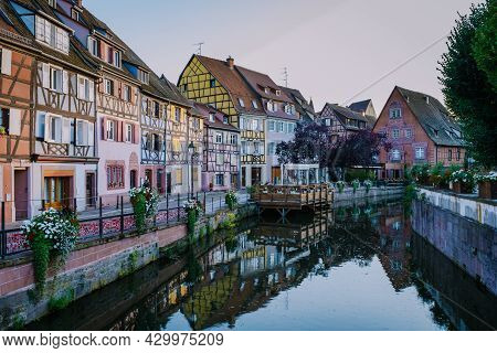 Colmar, Alsace, France. Petite Venice, Water Canal, And Traditional Half Timbered Houses. Colmar Is 