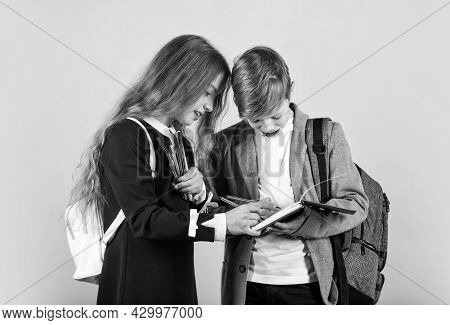 Use Your Imagination. Little Girl And Boy Do Painting In School. Drawing From Imagination. Childrens
