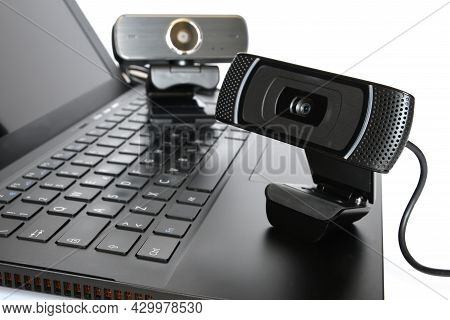Black Computer Webcam On Notebook Keyboard. Concept Of Smartwork