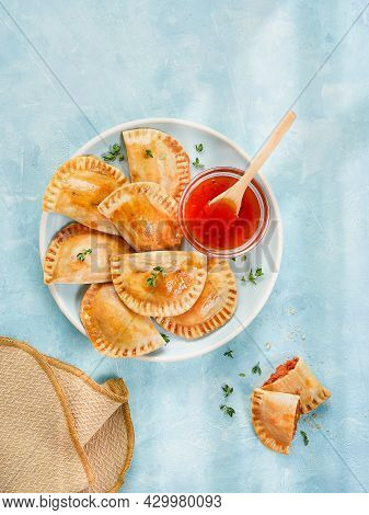 Pasta Filled With Tuna, Tomato Sauce, Bell Pepper And Boiled Egg Called Empanadilla. Spanish Mediter