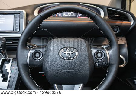 Novosibirsk, Russia - July 15, 2021:   Toyota Sienta, Auto Interior: Steering Wheel With  Logo    An