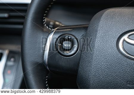 Novosibirsk, Russia - July 15, 2021:   Toyota Sienta, Black Steering Wheel With Multifunction Button