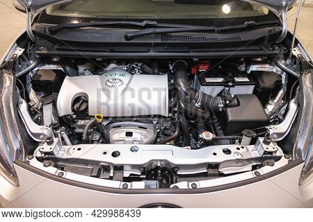 Novosibirsk, Russia - July 15, 2021:   Toyota Sienta, Car Engine Close-up. Internal Combustion Engin