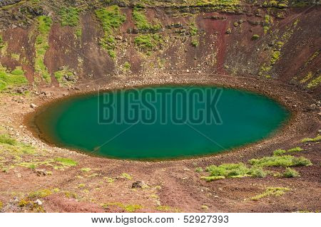 Kerid is a beautiful crater lake of a turquoise color located on the South-West of Iceland. 