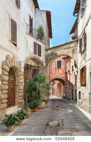 View of a beautiful little street in the old town in Tuscany, Italy