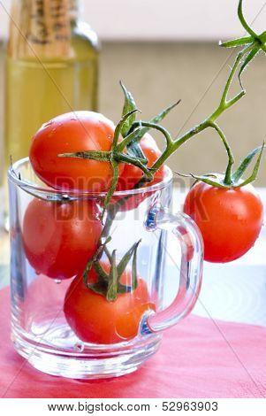 red tomatos in mug