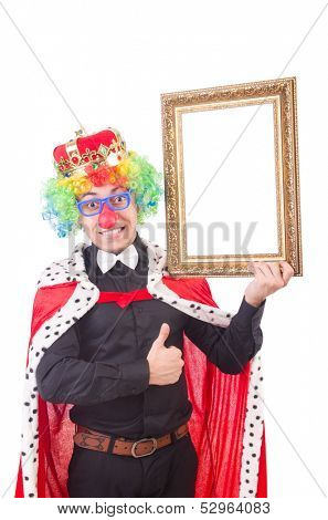Businessman with crown isolated on white