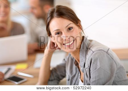 Young woman attending business training class