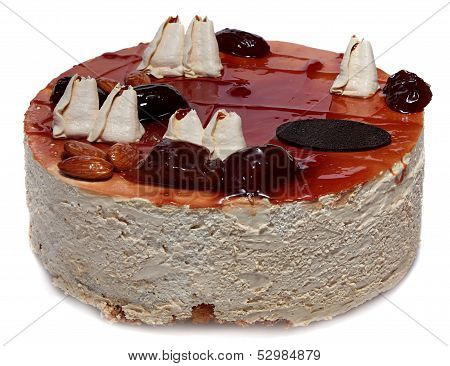 cream cake with caramel, nuts and dried fruits