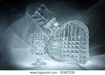 Still life with a crystal decanter and glass