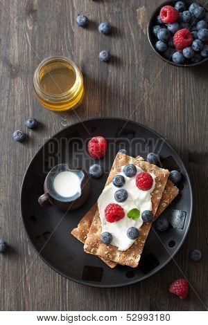 crisp bread with creme fraiche and berries