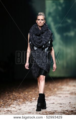 ZAGREB, CROATIA - OCTOBER 25: Fashion model wearing clothes designed by Etna Maar on the Cro a Porter show on October 25, 2013 in Zagreb, Croatia.