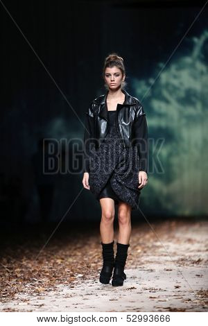 ZAGREB, CROATIA - OCTOBER 25: Fashion model wearing clothes designed by Etna Maar on the Cro a Porter show on October 25, 2013 in Zagreb, Croatia.