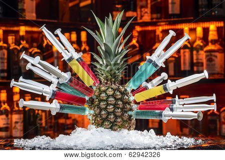 Colorful Cocktails With Pineapple In The Syringe Handle