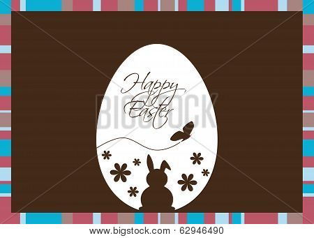 Vector Easter Egg with Greeting on a Brown Background