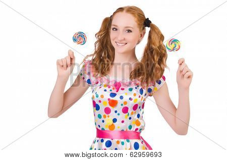 Redhead young girl with lolipops isolated on white