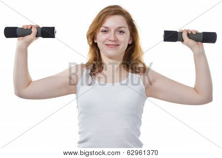 Portrait of a woman with dumpbells