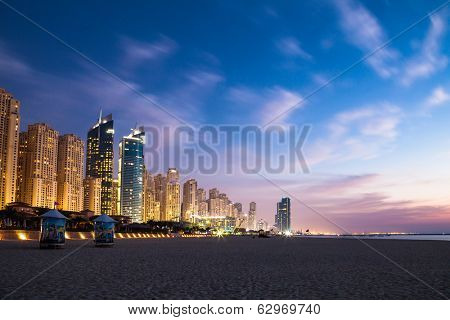 DUBAI, UAE - MARCH 29: Dubai Marina at Dusk from the top, on March 29, 2014, Dubai, UAE. In the city of artificial channel length of 3 kilometers along the Persian Gulf.