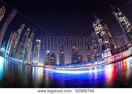 DUBAI, UAE - MARCH 29: Dubai Marina at Dusk from the top, on March 29, 2014, Dubai, UAE. In the city of artificial channel length of 3 kilometers along the Persian Gulf.