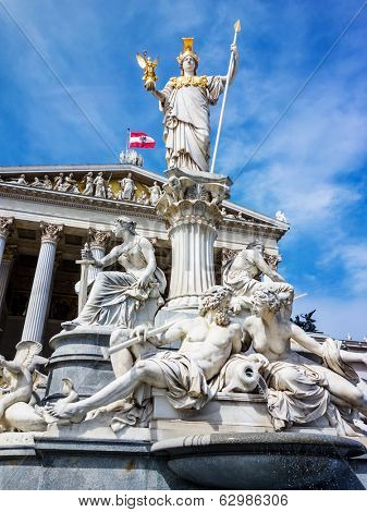 the parliament in vienna, austria. with the statue of 