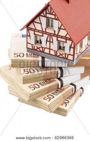 half-timbered house on euro banknotes, symbolic photo for home purchase, financing, building society